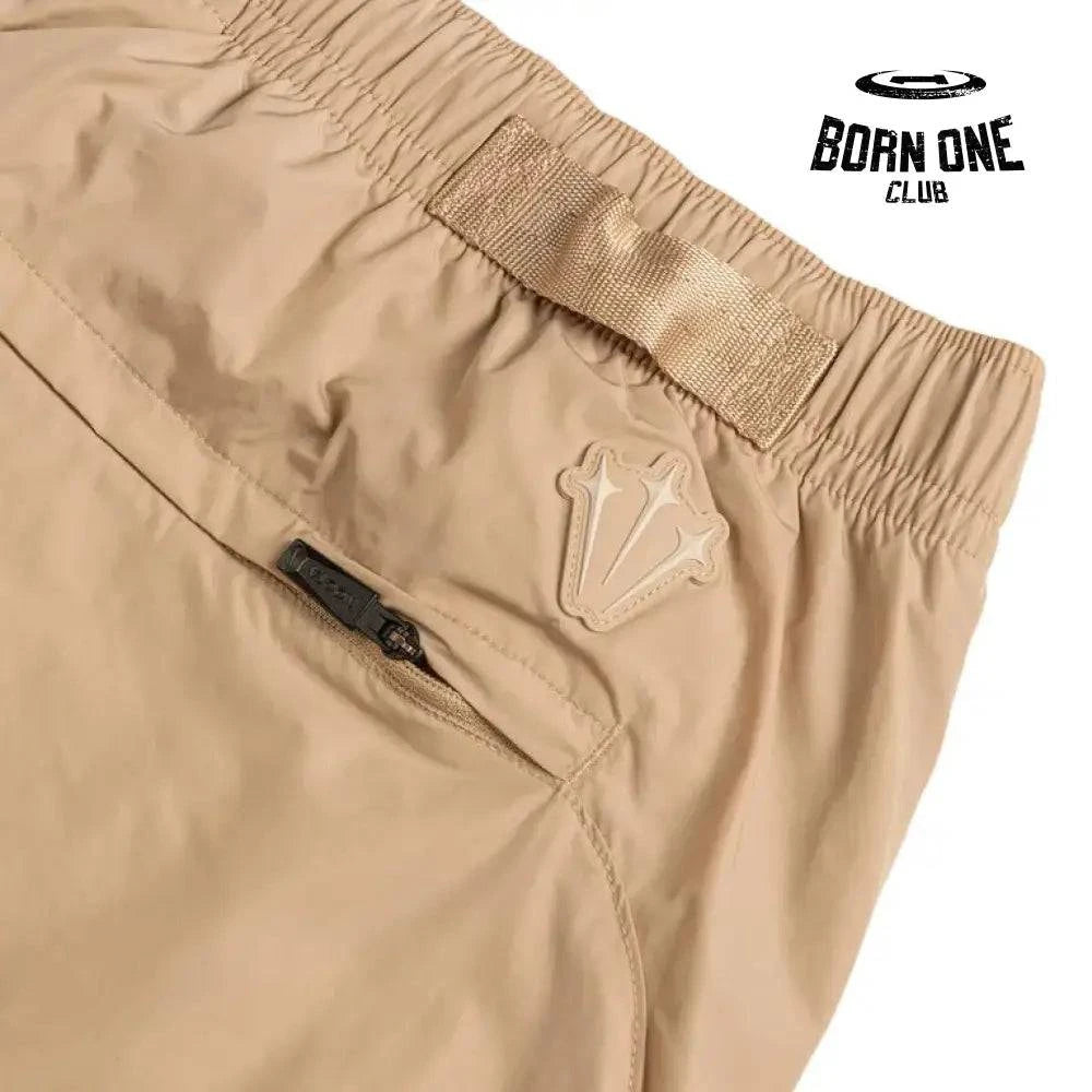 Conjunto Nike x NOCTA Woven Track Bege Areia/Marrom Claro Jaqueta e Calça