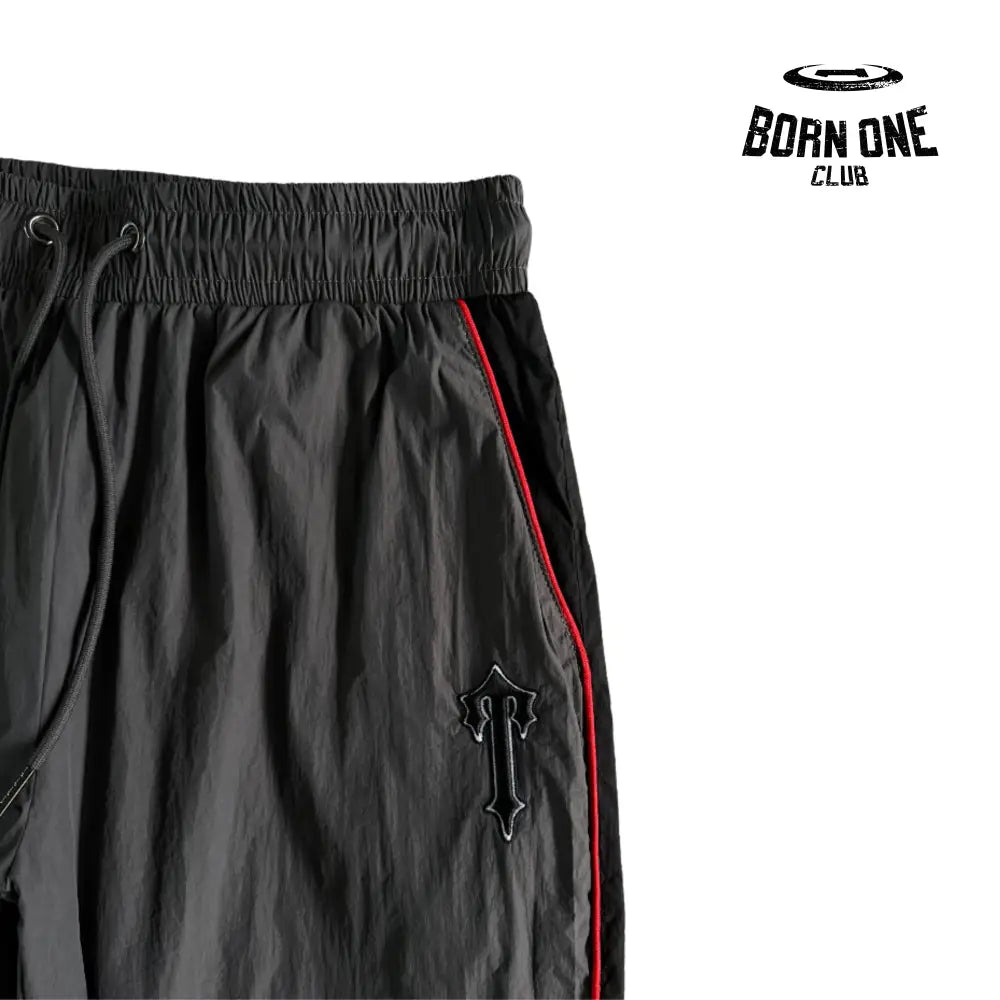 Conjunto Trapstar Irongate Shellsuit Black & Red