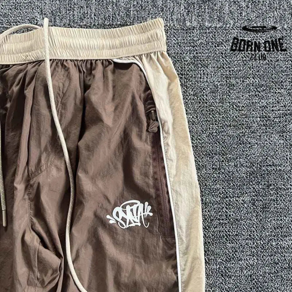 Conjunto Synaworld 'Syna Logo' Shell Marrom/Bege