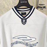 Camiseta Balenciaga Football V-neck Oversized Cinza
