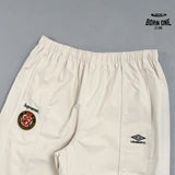 Conjunto Supreme x Umbro Cotton Ripstop Track Stone