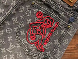 Calça Louis Vuitton Distressed Baggy Monogram Jeans