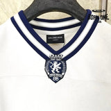 Camiseta Balenciaga Football V-neck Oversized Cinza