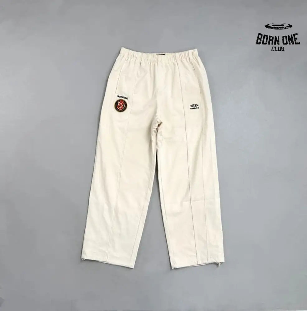 Conjunto Supreme x Umbro Cotton Ripstop Track Stone