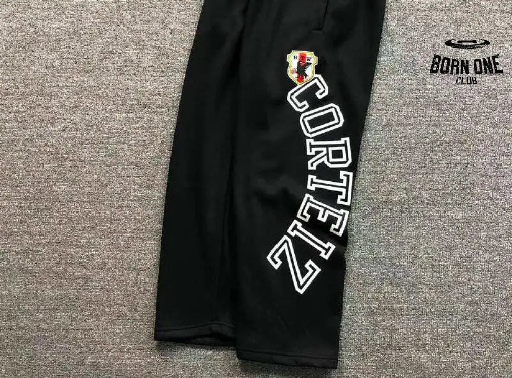 Conjunto Corteiz Arch Shield Zip Black
