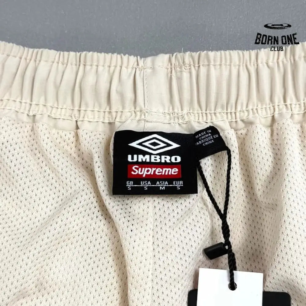 Conjunto Supreme x Umbro Cotton Ripstop Track Stone
