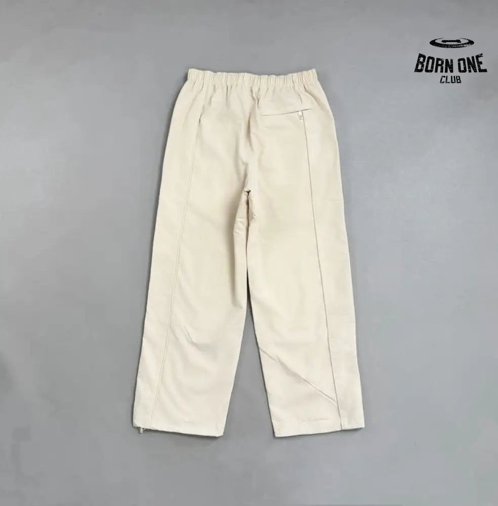 Conjunto Supreme x Umbro Cotton Ripstop Track Stone