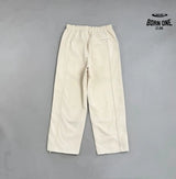 Conjunto Supreme x Umbro Cotton Ripstop Track Stone