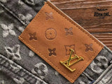 Calça Louis Vuitton Distressed Baggy Monogram Jeans