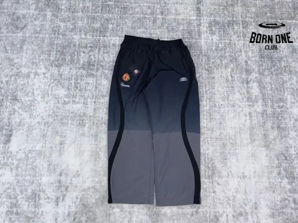 Conjunto Supreme x Umbro Gradient Track Black