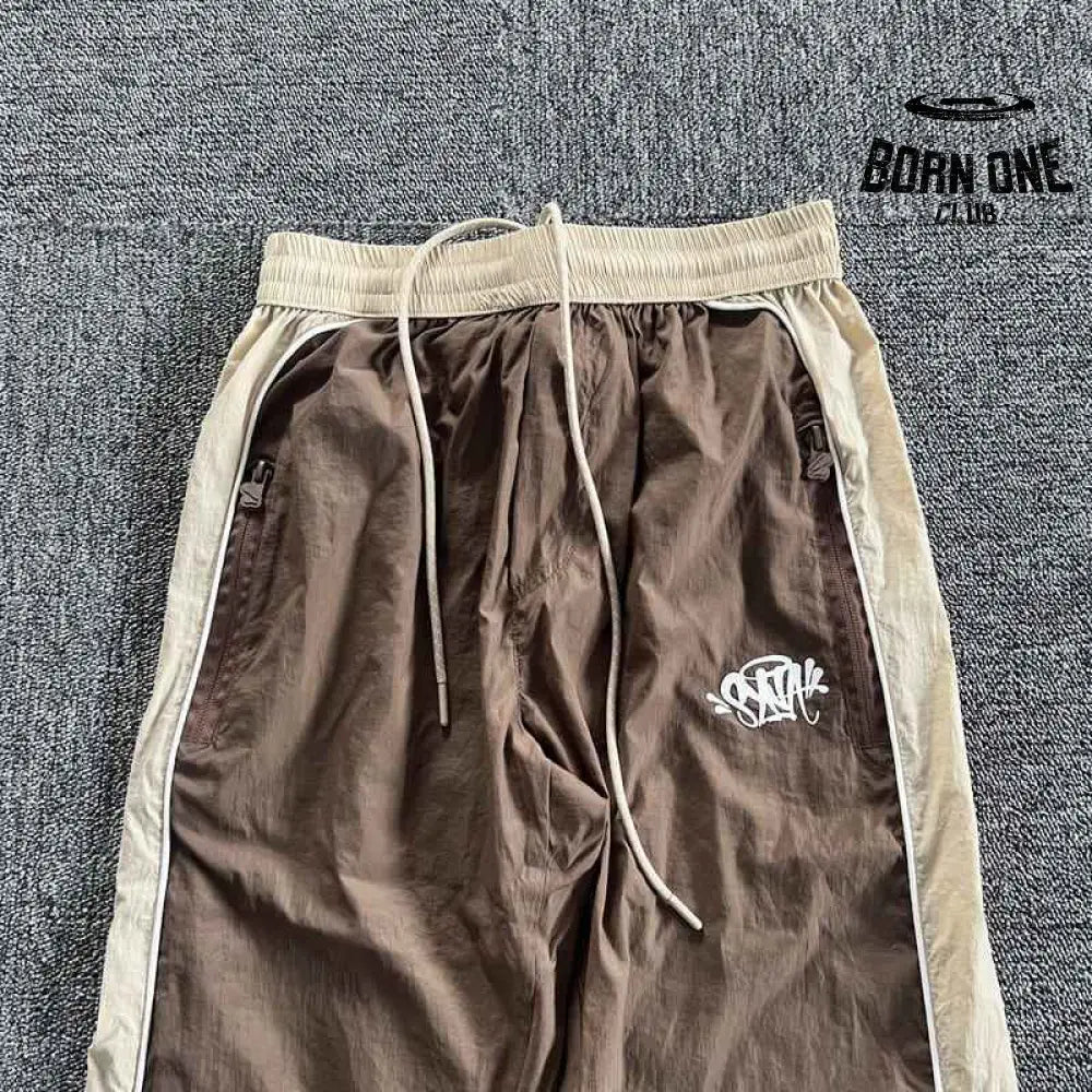 Conjunto Synaworld 'Syna Logo' Shell Marrom/Bege