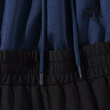 Balenciaga Cut-Up Tracksuit Pants in Black Calça