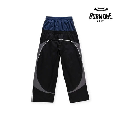 Balenciaga Cut-Up Tracksuit Pants in Black Calça