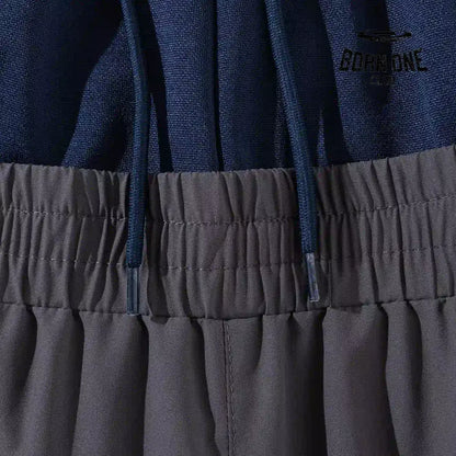 Balenciaga Cut-Up Tracksuit Pants in Grey Calça