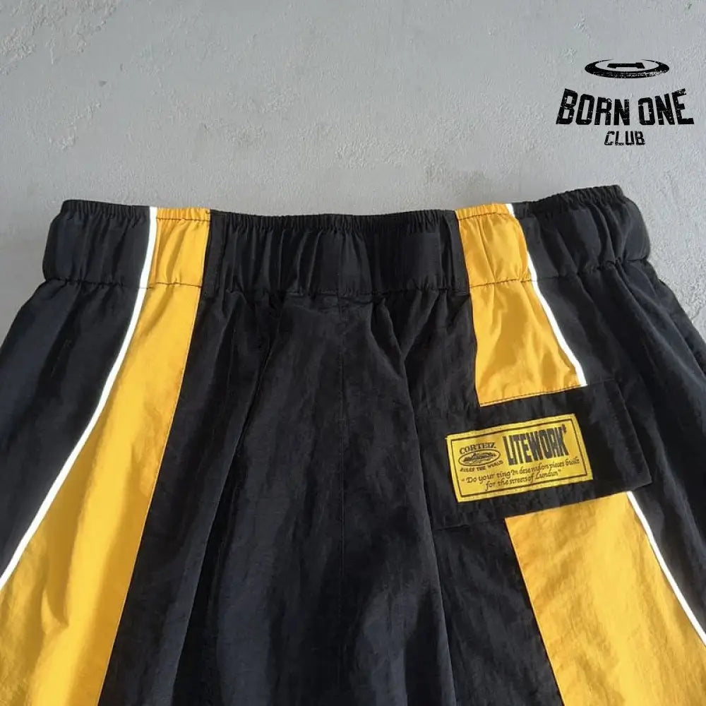 Shorts Corteiz Preto Amarelo
