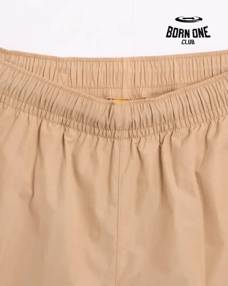 Conjunto Nike x NOCTA Woven Track Bege Areia/Marrom Claro Jaqueta e Calça