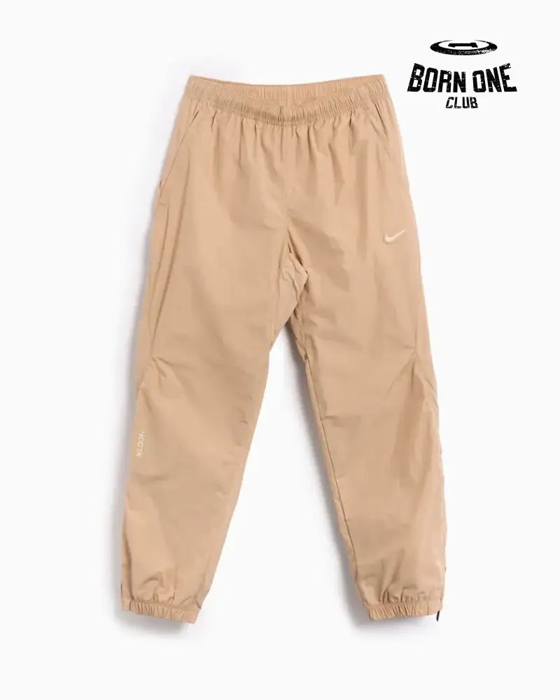 Conjunto Nike x NOCTA Woven Track Bege Areia/Marrom Claro Jaqueta e Calça