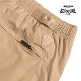 Conjunto Nike x NOCTA Woven Track Bege Areia/Marrom Claro Jaqueta e Calça