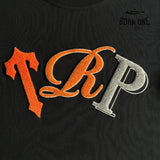 Conjunto Trapstar Shortset TRP Black & Orange