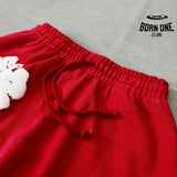 Denim Tears Calça de Moletom Red